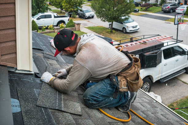 Professional Emergency Roof Repair technician working in Mooreton, ND